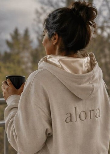The alora hoodie in cream, back view